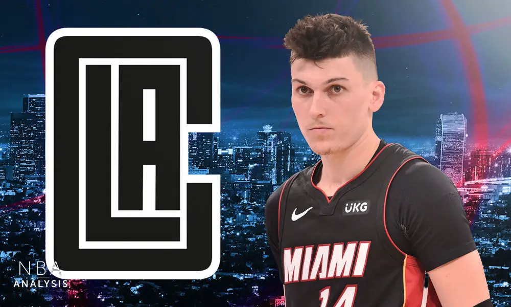 Miami Heat player Tyler Herro offers help at Miami building